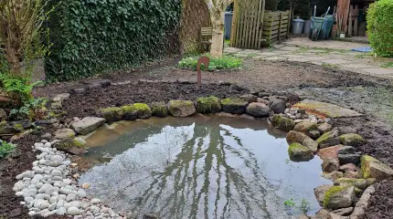 Wildlife pond restoration with a deep filled bog area
